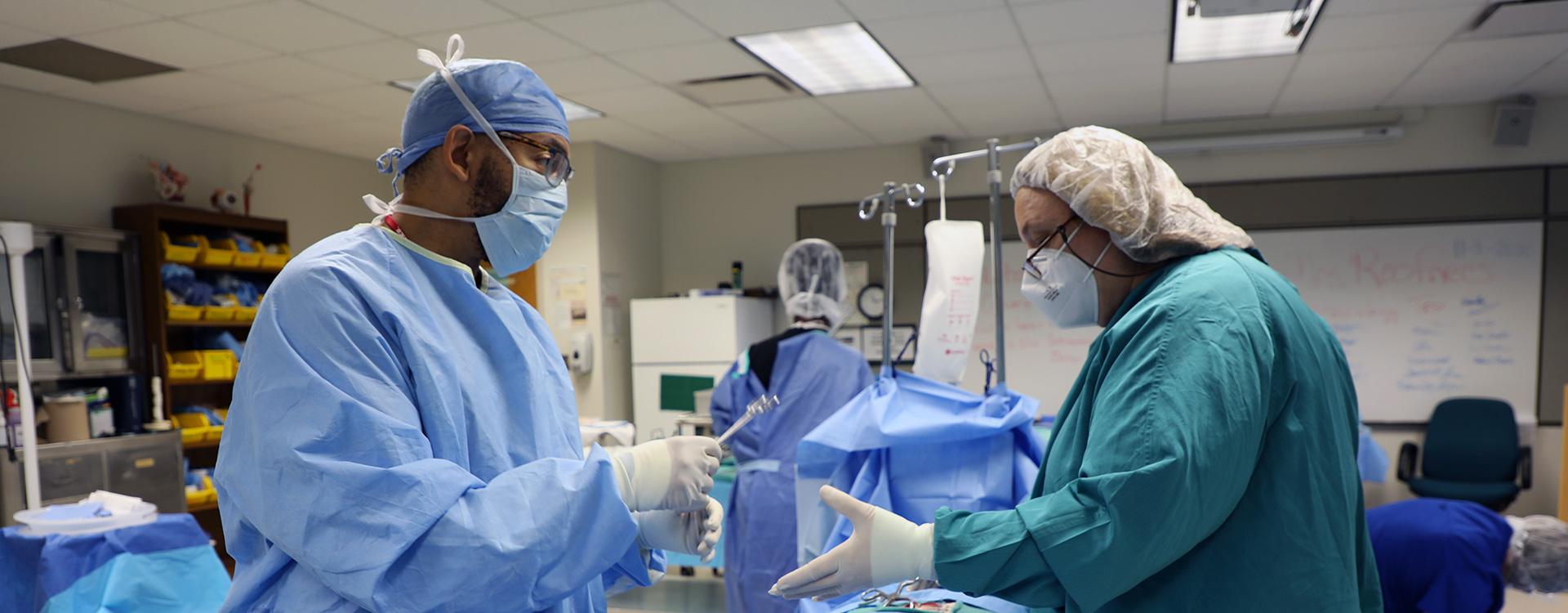 mock surgery where student passes scissors to "surgeon"